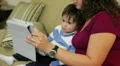Hispanic mother and son using tablet HD Footage