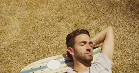 Hispanic sleeping napping outdoors Video stock 55424414