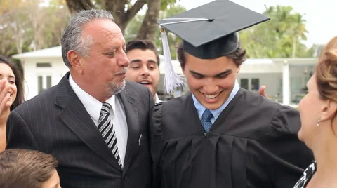 Hispanic Student And Family Celebrating Graduation Stock Footage