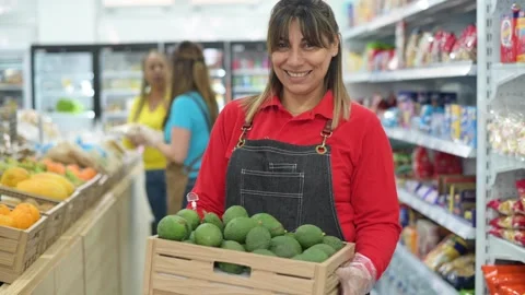 Hispanic vendor with box of limes Stock Footage 269343347
