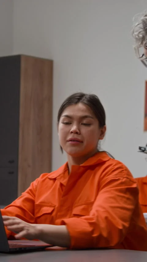 Hispanic Woman Asking Question during Class in Correctional Facility Vertical Stock Footage 329003130