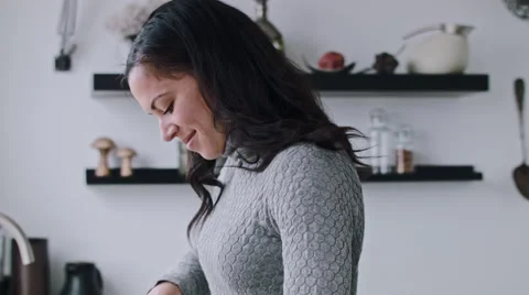 Hispanic woman in kitchen Stock Footage 53087364