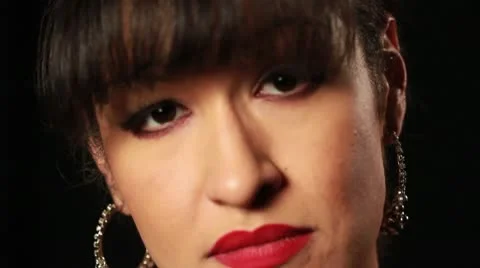 Hispanic Woman Looks Up Stock-Footage 8991053