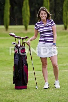 Hispanic Woman Playing Golf