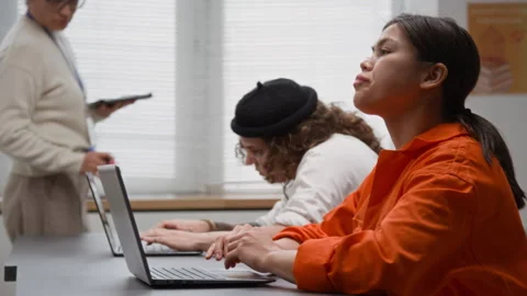 Hispanic Woman Using Laptop in Computer Class at Prison Stock Footage 328998513
