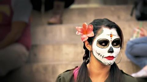 Hispanic woman using Skull Makeup, Mexico Stock Footage 66458097