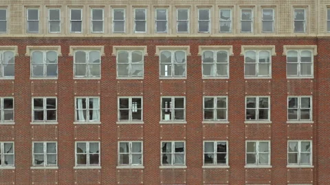 Historic abandoned brick skyscraper in downtown - apartment / office / hotel Stock Footage 151869990