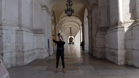 Historic Arcade Hyperlapse at Praca do Comercio Lisbon Yellow Colonnade Stock Footage 308934628