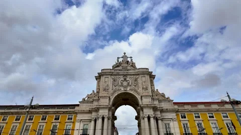Historic arch against a dramatic cloudy sky in Lisbon. Stock Footage 327685365