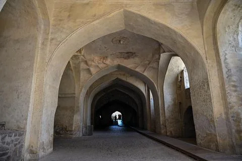 Historic Arched Corridor Inside Ancient Stone Fortress with Medieval Archit.. Stockfoto's