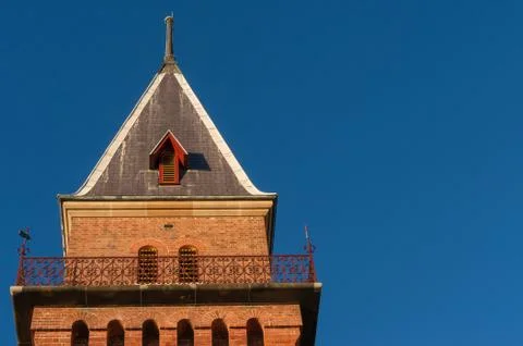 Historic architecture background with old red brick castle tower Stock Photos