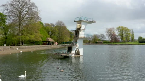 Historic Art Deco Diving Platform At Coate Water Park Lake Vídeos de archivo 341224271