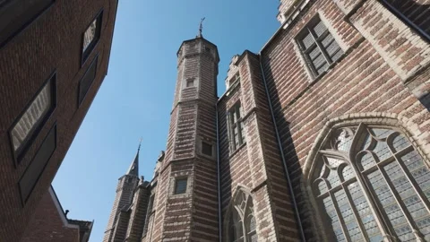 Historic brick facade of Museum Vleeshuis in Antwerp with towers and Gothic Stock Footage 296623795