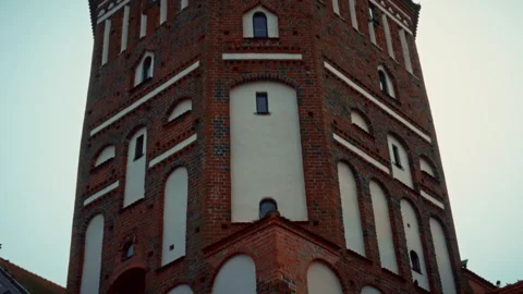 Historic brick tower against a dramatic sky Stock Footage 301125322
