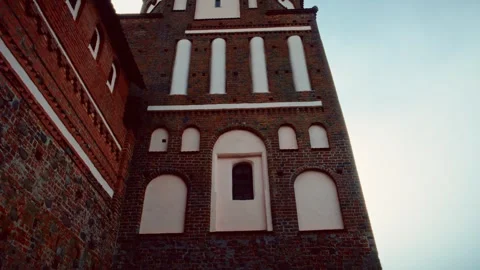 Historic brick tower against a dramatic sky Stock Footage 301125373