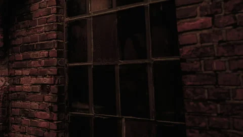 Historic brick wall with large window in dimly lit room showing textures Stock Footage 340234545