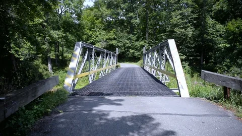 Historic Bridge Over a Trout Stream in the Mountains 動画素材 93218657