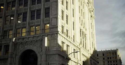 Historic building illuminated by soft light on a cloudy day in the city Ilustración de archivo