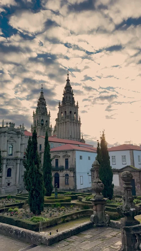 Historic Cathedral Towers Under Dramatic Cloudy Sky Stock Footage 278534096