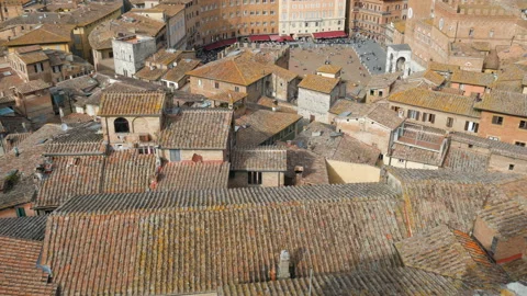 Historic centre of Siena, arial view, Piazza del Campo with Palazzo Pubblico Stock Footage 107822711