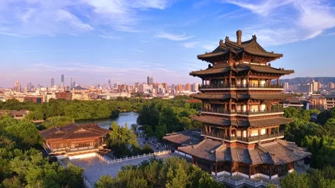 Historic Chaoran Tower &amp; Daming Lake with Jinan City Skyline at Sunset Stock Footage 331119829