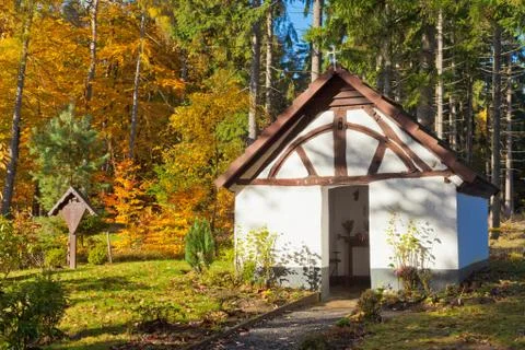 Historic chapel in fall forest, eifel, germany Stock Photos