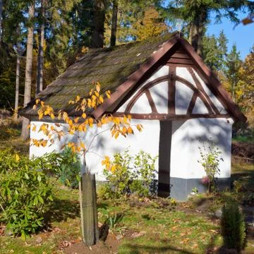 Historic chapel in fall forest, eifel, germany Stock Photos