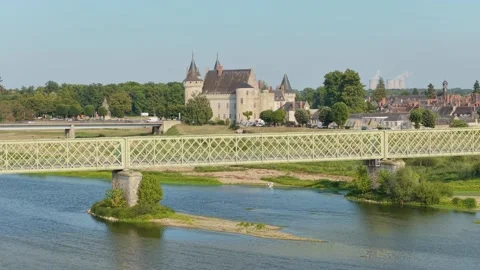 The historic Chateau de Sully-sur-Loire with its towers and stone walls, seen Stock Footage 346720725