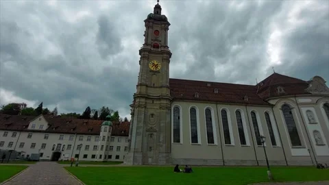 Historic Church Clock Tower Against Dramatic Cloudy Sky, St. Gallen 4K Stock Footage 340923731
