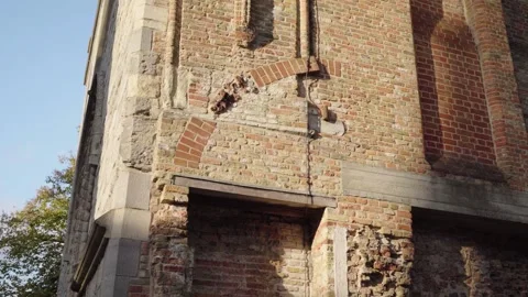 Historic church wall with stone arches and ruins in Bruges, Belgium Stock Footage 329052843