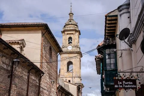 Historic Clock Tower Framed by Colonial Buildings Stock Photos