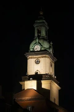 Historic clock tower at night Фото