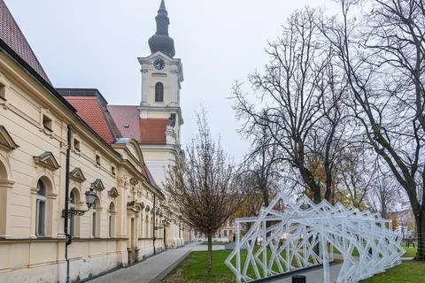 Historic Clock Tower Overlooking Red Tile Roofs, Church of Saints Eusebius .. Stock Photos