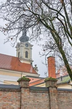 Historic Clock Tower Overlooking Red Tile Roofs, Church of Saints Eusebius .. Stock Photos