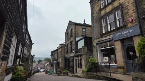 Historic Cobbled Main Street Lined with Stone Buildings 스톡 동영상 346522988