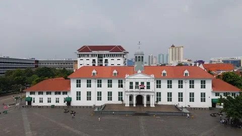 Historic colonial plaza captured in wide aerial view with people below Stock-Footage 321663647