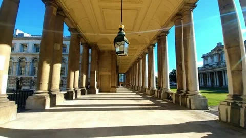 Historic colonnade walkway with classical architecture and sunny sky Video stock 344041626