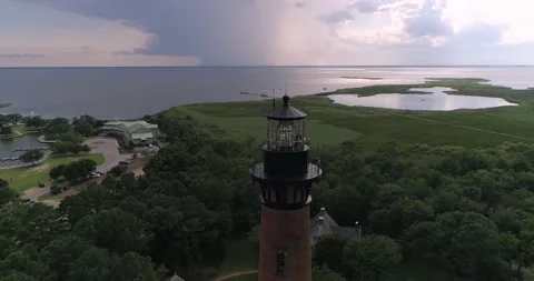 Historic Currituck Beach Lighthouse in Corolla, NC.  Aerial drone shot in the Ou Video stock 135412151