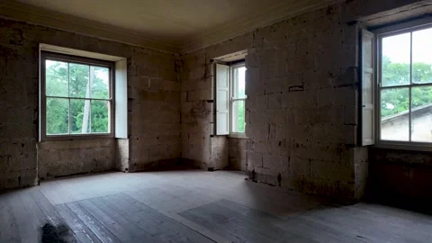 Historic Empty Room with Bare Stone Walls Awaiting Renovation Project. pan left Stock Footage 339913062