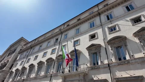 Historic facade of Palazzo Chigi with flags in Rome Italy Stock Footage 338009564