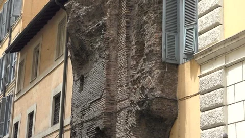 Historic fortification wall survives between modern buildings - Boundary Scene Stock Footage 339815761