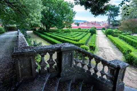 Historic garden with trimmed hedges and stone balustrade in Belem, Lisbon, .. Stock Photos