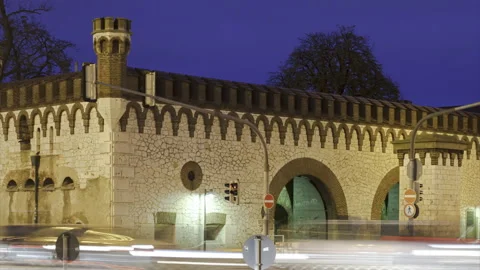 Historic gate Ehinger Tor in Ulm with traffic at evening time-lapse Stock Footage 186534386