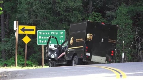 Historic gold mining town,UPS driver getting out Stock Footage 42940425