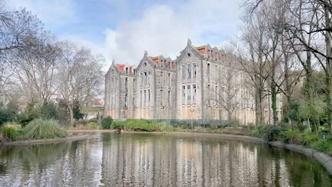 Historic Gothic Building Reflected in Pond Park, Portugal Video stock 340068286
