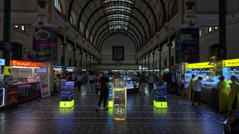 The historic interior of Saigon Central Post Office, bustling with tourists and Stock Footage 305450178