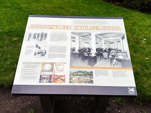Historic interpretive information panel at St Andrews House serving Scotlan.. Stock Photos