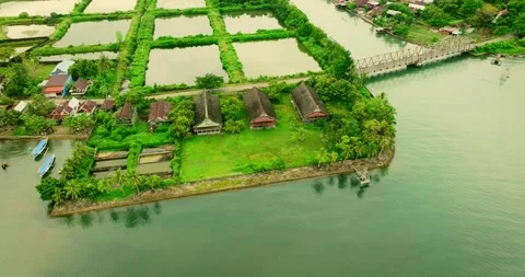 Historic Mansion Between Beach and Fishpond - Aerial Drone Shot Stock Footage 310674052