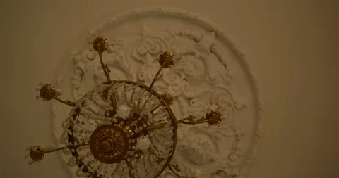 Historic mansion interior. Looking upward at chandelier Stock-Footage 336099476