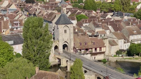 The historic medieval stone gate and bridge in Moret-sur-Loing, France Stock Footage 346702549